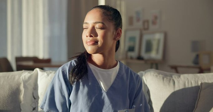 Calm, thinking and a nurse or woman on the sofa to relax from a career in healthcare in a house. Smile, peace and a medical employee or doctor with an idea or vision on the couch for a memory