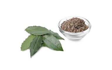 Bowl with different spices and fresh bay leaves on white background