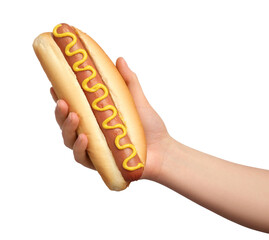 Woman holding delicious hot dog with mustard on white background, closeup