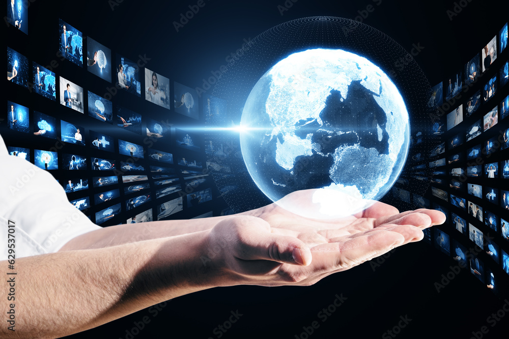 Poster close up of businessman hands holding creative glowing polygonal globe with rows of images on dark b