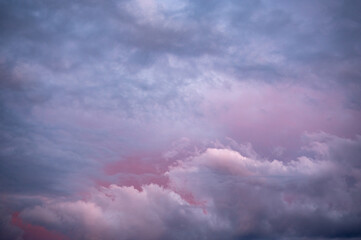 Naklejka na ściany i meble Colored sky with clouds