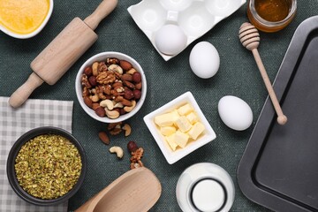 Different ingredients for making delicious baklava on table, flat lay