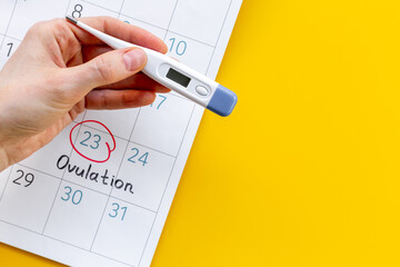 Ovulation day marked on calendar for pregnancy planning