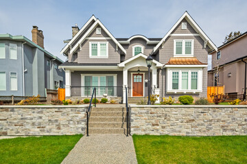 Luxury residential houses with landscaped front yard on land terrace