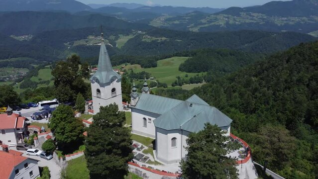 A drone view of an old church located on a hill. The camera slowly zooms out. Zasavje Holy Mountain, The Mary&rsquo;s Nativity Church