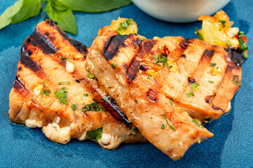 Tuna steak fried with grilled vegetables.