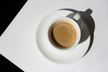 Freshly Made Espresso Coffee in Small Ceramic Cup on White Background. Cafe.