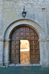 Fototapeta na wymiar Historic entryway to the medieval monastery near the ancient abbey of Casamari, Italy