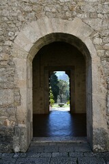 Fototapeta premium Historic entryway to the medieval monastery near the ancient abbey of Casamari, Italy