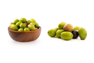 Small pile of olives. Fresh olives in bowl isolated on white background. Olives on white background. Green and black olives close up.
