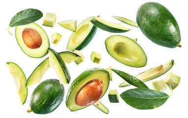 Avocado fruits. leaves and avocado slices levitating in the air isolated on white background.