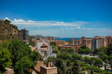 Fototapeta na wymiar Cityscape from Gibralfaro Castle walls over Malaga downtown