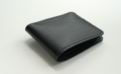 leather black men's wallet handmade from different sides on a white background