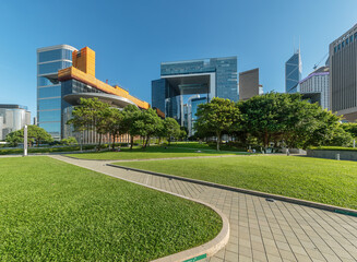 Public park and skyline in downtown district of Hong Kong city - 629578041