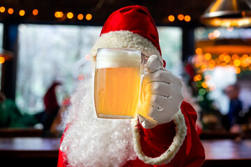 Santa Claus drinking beer in the bar