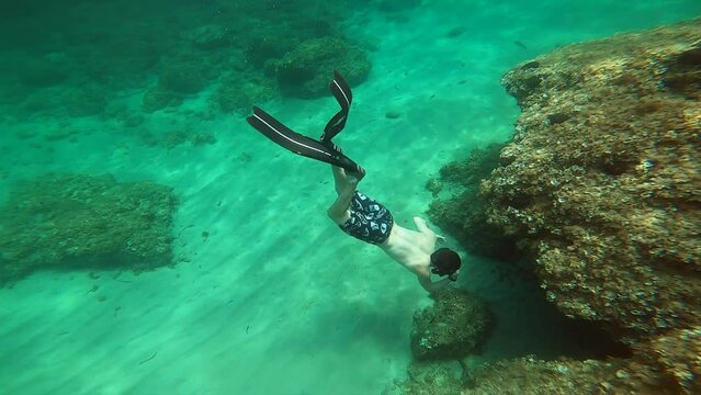diving rock formation cave sport athlete mediterranean sea ibiza fish