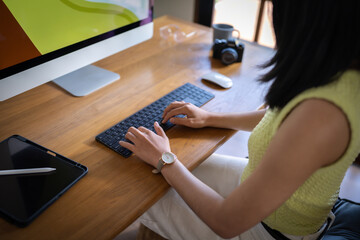 Graphic designer working on digital tablet and computer. Designer Asian Woman artist drawing on graphic tablet  Artist Creative Designer sketch graphic drawing creative