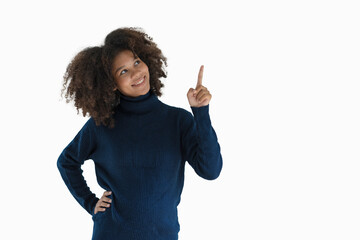 Joyful young professional having a new idea, pointing index finger up. African American...