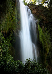 Fototapeta na wymiar Impressive Cola de Caballo waterfall in the Monasterio de Piedra natural park, Zaragoza, Aragon, Spain