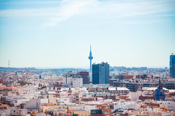 Cityscape panorama of Madrid and Faro de Moncloa on background