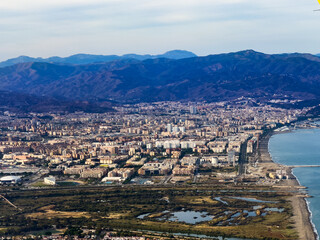 Malaga town houses and city beach from the airplane