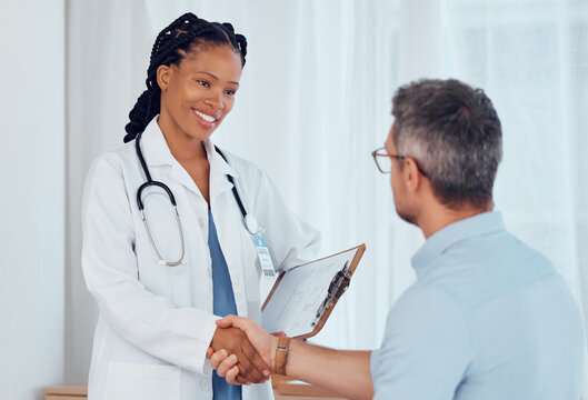 Doctor, patient and people shaking hands, smile and hospital checkup with healthy diagnosis, healthcare results or support. Clinic nurse, trust and surgeon welcome, thank you or hand shake for client