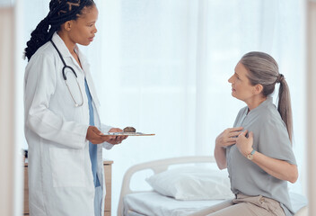 Healthcare, consultation and doctor with senior patient in discussion on chest pain problem....