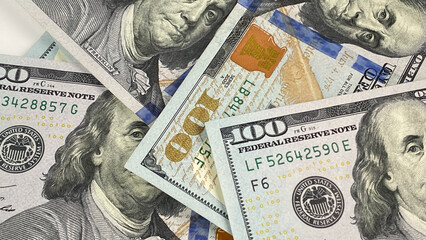 $100 bills. Financial business background concept. American national currency, close-up. Cash...