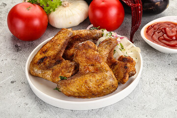 Grilled chicken wings with sauce