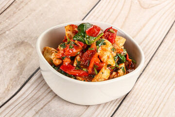 Chicken with tomato and spinach