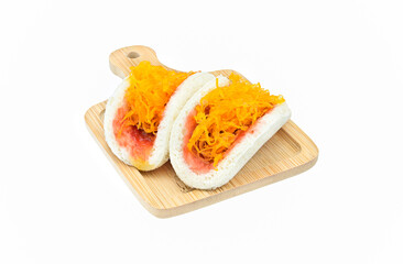 Strawberry Jam sandwich and golden threads in bamboo plate on white background close up,isolated