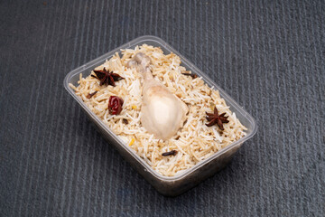 chicken pulao in a box, chicken biryani box on table