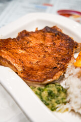Delicious fried chicken chop and egg rice bowl in Hong Kong tea restaurant