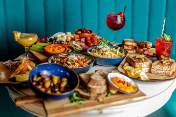 Assortment of delicious food and refreshing drinks on the table
