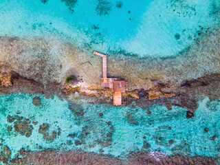 Aerial view of a small fishing dock off the coast of Aruba.