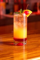 Refreshing cocktail on a wooden table