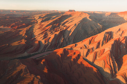 Aerial view of triangular shaped rocks along San Juan River, near Mexican Hat, Utah, United States.