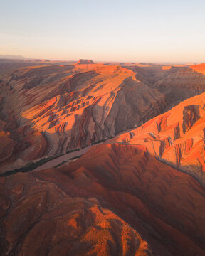 Aerial view of triangular shaped rocks along San Juan River, near Mexican Hat, Utah, United States.