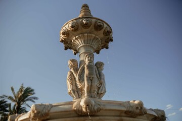 a close up view of a fountain with water running from it