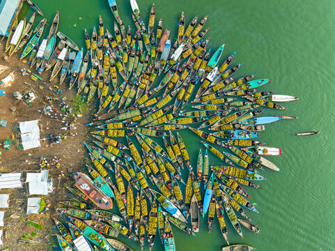 Aerial view of floating market of seasonal fruits on the boats in Kaptai Lake, Rangamati, Bangladesh.