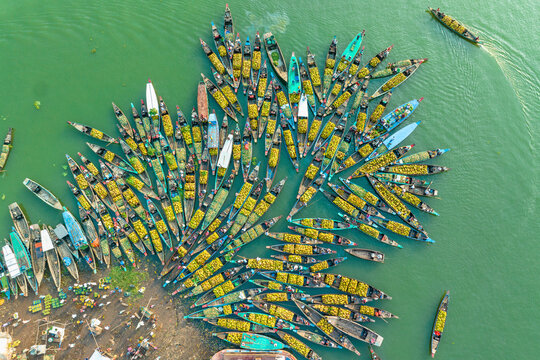 Aerial view of floating market of seasonal fruits on the boats in Kaptai Lake, Rangamati, Bangladesh.