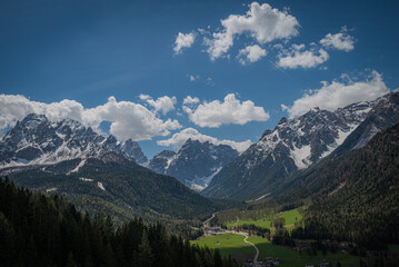 Fototapeta na wymiar landscape of beautiful mountains in the alps cloudy day with blue sky