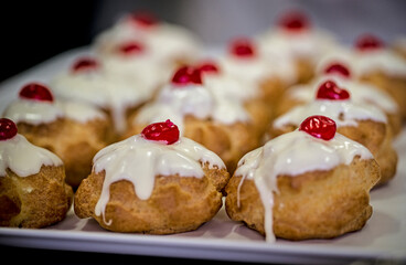 Production of delicious desserts with cream and cream in a confectionery factory in Sicily, Italy.
