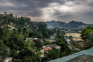 Obraz premium Aerial view of the cityscape, shrouded by a layer of cloud cover