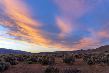 Fototapeta na wymiar Dramatic sunset with vibrant colors in the Nevada desert in Washoe Valley near Reno and Carson City