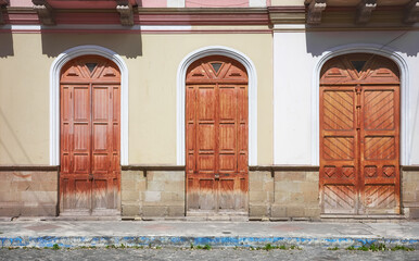 Street view of an old building facade, architecture background, Riobamba, Ecuador.