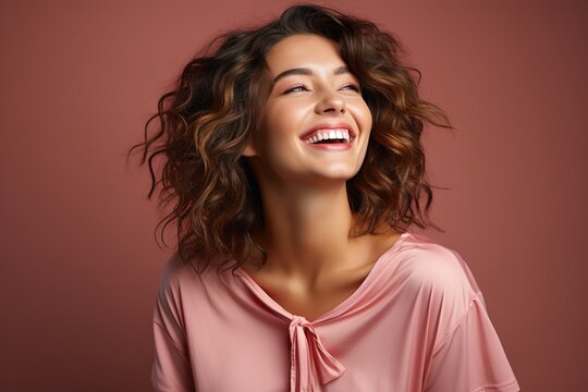 portrait of a cheerful girl in pink colors