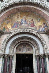 Piazza san Marco - Gate of Basilica san marco with tourists - Venice - Italy