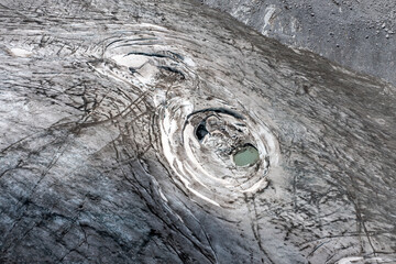 aerial view of the circular crevasses of the Adamello glacier in Trentino