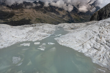 aerial view of the river produced by the Adamello glacier in Trentino